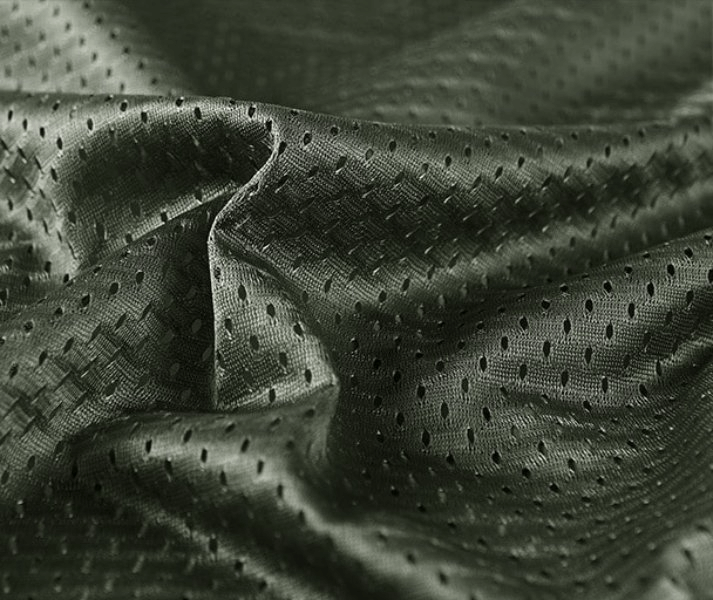 Close-up of textured green nylon fabric with perforated design for Men's Quick-Dry Slim Waistcoat SF1161
